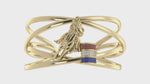Load and play video in Gallery viewer, Criss-Cross Barrel Design in Ruby, Diamond &amp; Sapphire with Horse Racer wide Cuff